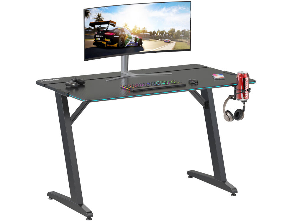 Biurko MAD DOG GD100K Czarny Biurko dla gracza z szerokim blatem o teksturze włókna węglowego, wyposażone w uchwyt na słuchawki i napój.