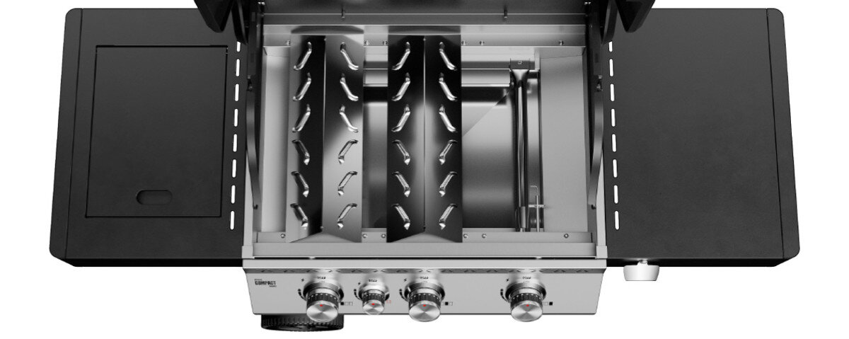 Zdjęcie przedstawia wnętrze grilla gazowego z otwartą pokrywą, ukazujące trzy palniki i metalowe elementy konstrukcyjne. Na panelu przednim znajdują się trzy pokrętła do regulacji gazu.