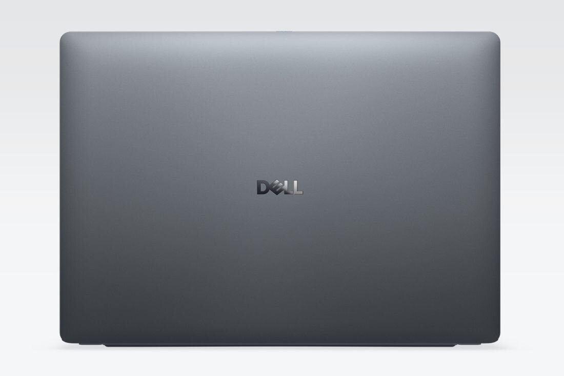 Laptop Dell Pro Premium prezentuje zamkniętą obudowę z logo na jasnym tle w kontekście mobilnej pracy biznesowej.