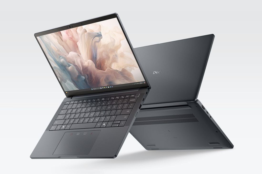 Laptop Dell Pro Premium prezentuje smukłą obudowę i ekran z abstrakcyjną grafiką na jasnym tle w pracy mobilnej.