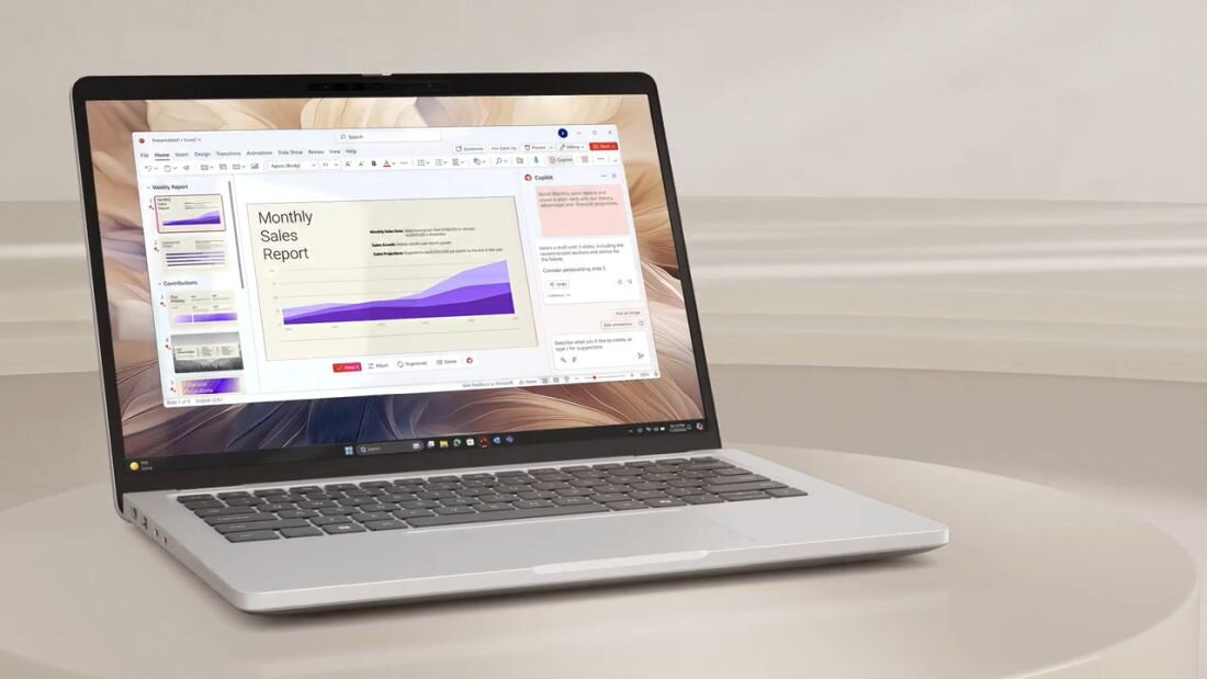 DELL Pro 13 Plus laptop na białym biurku z otwartym PowerPoint prezentacją Monthly Sales Report z fioletowymi wykresami, demonstrując możliwości biznesowe i prezentacyjne - Opis serii Pro 13 Plus