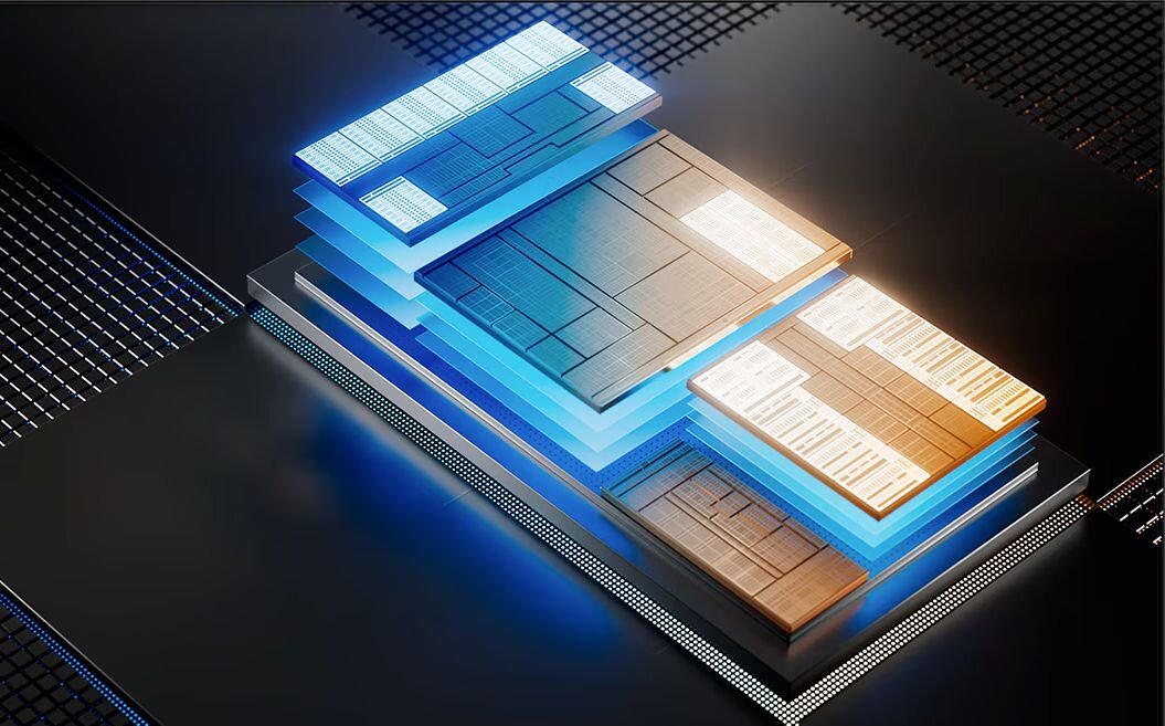 Trójwymiarowa wizualizacja warstwowego układu scalonego w niebiesko-pomarańczowej kolorystyce – procesor Intel Core Ultra 5 236V Lunar Lake grafika Intel Arc Graphics 130V laptopa DELL Pro 14 Plus PB14250 BTO212