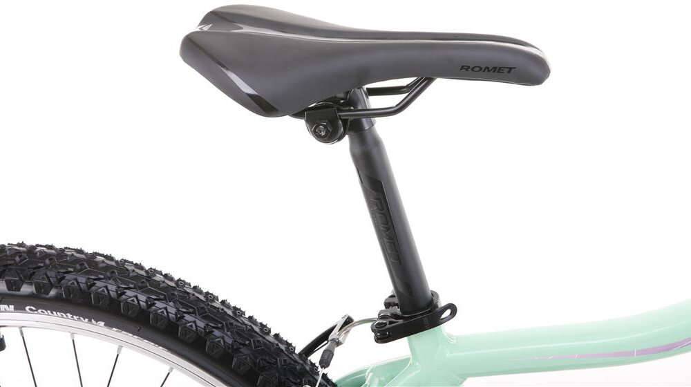 Rower górski MTB ROMET Jolene 6.1 D19 26 cali damski Zielono-fioletowy siodełko na białym tle siodełko ROMET aluminiowa sztyca ROMET o średnicy 27,2 mm i długości 300 mm można dopasować wysokość siodła do wzrostu użytkownika i stylu jazdy lekka konstrukcja sztycy wspiera manewrowanie rowerem ergonomiczne ułożenie siodełka minimalizuje zmęczenie