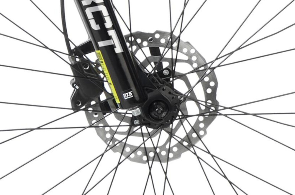 Rower górski MTB ROMET Rambler R7.4 U18 27.5 cala Biało-złoty zbliżenie na hamulec podstawa bezpieczeństwa hamulce tarczowe hydrauliczne duża siła hamowania w każdych warunkach pogodowych i na każdej trasie płyn hamulcowy hamulce z przodu i z tyłu podwójny pakiet bezpieczeństwa