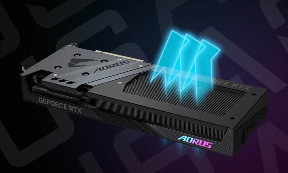 Karta graficzna GIGABYTE GeForce RTX 5060 Aorus Elite 8GB Ujęcie pod kątem przedstawiające trzy wentylatory z włączonym wielokolorowym podświetleniem wokół ich obwodu