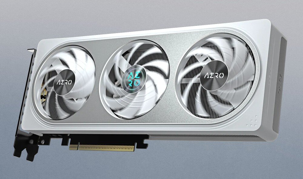 Karta graficzna GIGABYTE GeForce RTX 5060 Aero OC 8GB DLSS 4 Zbliżenie na trzy wentylatory karty Gigabyte AERO w ruchu, z widocznym podświetlonym logo AERO na centralnym wentylatorze