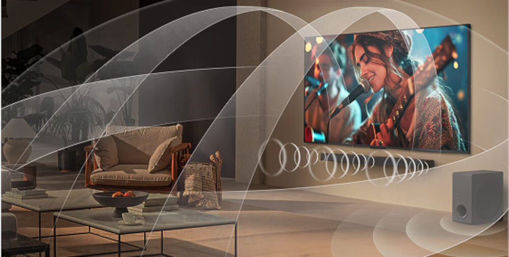 Telewizor LG 65NANO81A6A WOW Orchestra dźwięk wielopasmowy, telewizor zawieszony na ścianiead soundbarem, dźwięk wydobywający się z urządzeń