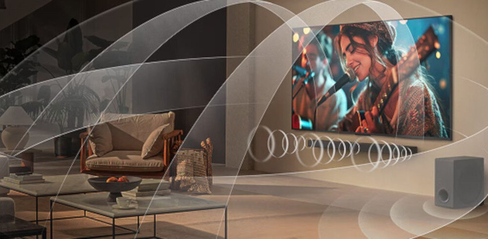Telewizor LG 50QNED70A6A WOW Orchestra wielopasmowy dźwięk, telewizor z soudbarem zwieszony na ścianie oraz z subwooferem z których wydobywa się dźwięk