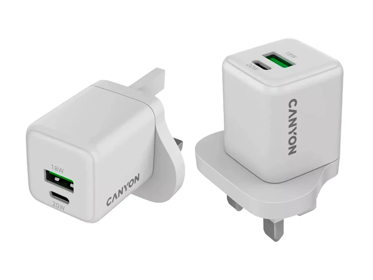 Na obrazie widoczne są dwie białe ładowarki sieciowe z logo \'CANYON\'. Jedna z nich ma oznaczenia \'18W\' i \'20W\' przy portach USB.