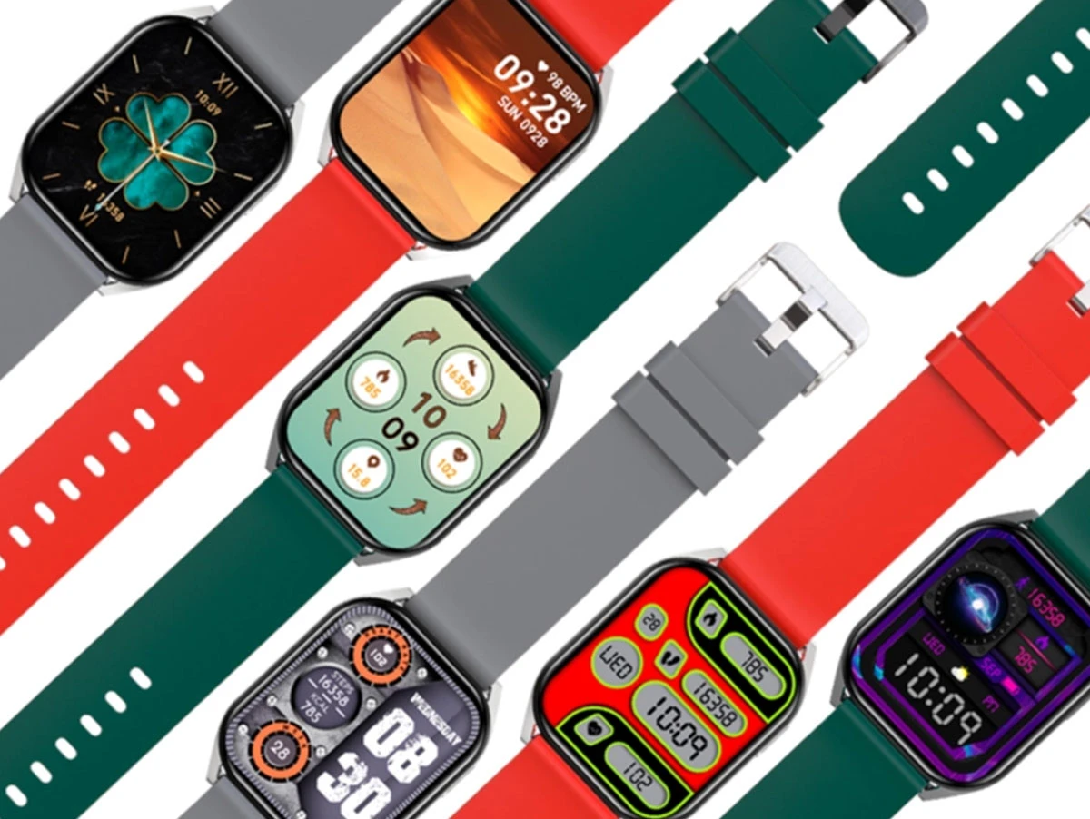 Na obrazie widoczne są różne modele smartwatchy z kolorowymi paskami i różnymi tarczami wyświetlaczy. Tarcze pokazują różne informacje, takie jak czas, datę i kroki.