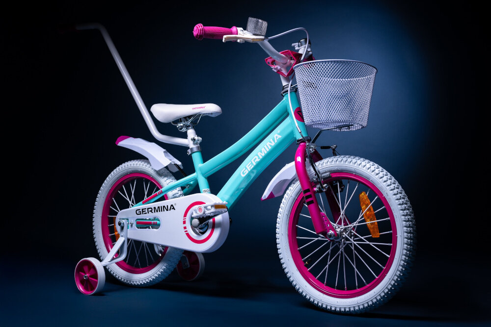 Rower dziecięcy GERMINA BMX 16 cali dla dziewczynki Błękitny ciemne tło rower widoczny od przodu pod skosem dla dzieci w wieku od 4 do 6 lat trwałość wytrzymałość mocna konstrukcja