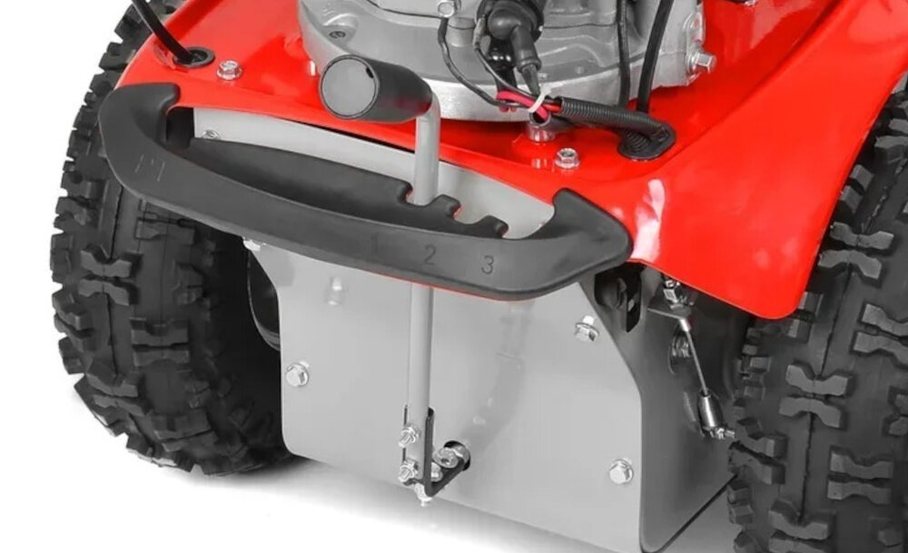 Zamiatarka spalinowa HECHT 8101S zbliżenie na dźwignię do zmiany kierunku szczotki szczotka z możliwością ustawienia w lewo środek i prawo sprzątanie przy krawężnikach ścianach i ogrodzeniach poprawia organizację pracy skraca czas pracy