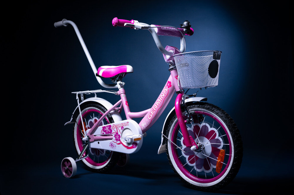 Rower dziecięcy GERMINA BMX 16 cali dla dziewczynki Jasnoróżowy ciemne tło rower widoczny od przodu pod skosem dla dzieci w wieku od 4 do 6 lat trwałość wytrzymałość mocna konstrukcja