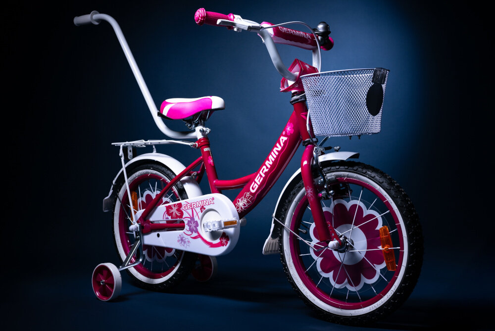 Rower dziecięcy GERMINA BMX 16 cali dla dziewczynki Ciemnoróżowy ciemne tło rower widoczny od przodu pod skosem dla dzieci w wieku od 4 do 6 lat trwałość wytrzymałość mocna konstrukcja