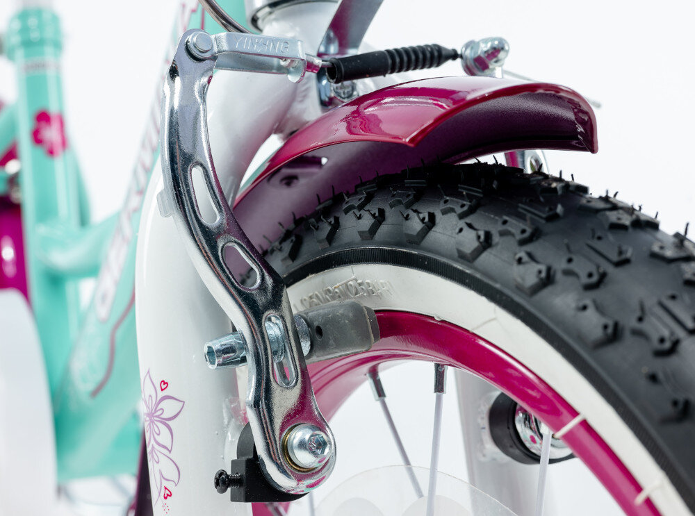 Rower dziecięcy GERMINA BMX 16 cali dla dziewczynki Miętowy zbliżenie na przedni hamulec zdjęcie na białym tle podstawa bezpieczeństwa przedni hamulec V-Brake tylny hamulec nożny Torpedo lekkie duża siła hamowania reflektory odblaskowe na szprychach dobra widoczność na drodze bezpieczeństwo