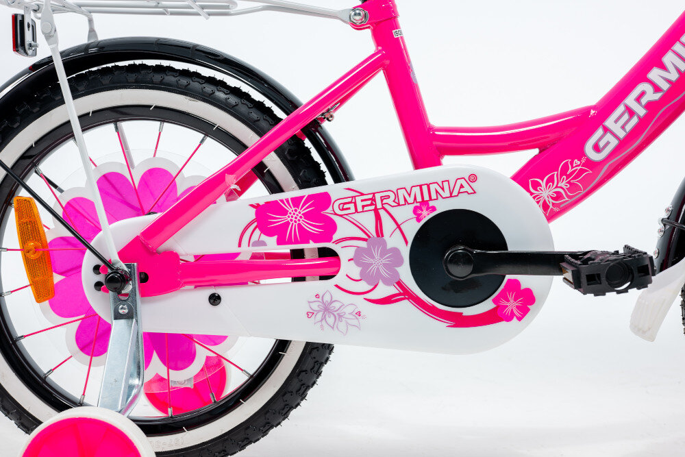 Rower dziecięcy GERMINA BMX 16 cali dla dziewczynki Czarno-różowy zbliżenie na osłonę łańcucha boczne kółka asekurują dziecko w początkowej fazie nauki boczne kółka można łatwo usunąć osłona łańcucha grafika w kwiatki zabezpiecza łańcuch przed brudem