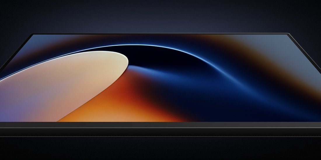 Zdjęcie monitora XIAOMI wykonane od dołu, tło jest ciemne.