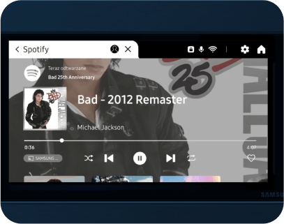 spotify Ekran urządzenia wyświetla aplikację Spotify z utworem \'Bad - 2012 Remaster\' wykonawcy Michael Jackson. Widoczne są przyciski sterowania odtwarzaniem oraz ikony aplikacji i ustawień.