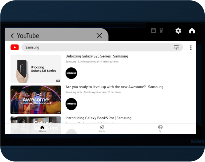 youtube Ekran urządzenia wyświetla stronę YouTube z wynikami wyszukiwania dla \'Samsung\'. Widoczne są trzy filmy: \'Unboxing Galaxy S25 Series | Samsung\', \'Are you ready to level up with the new Awesome? | Samsung\' oraz \'Introducing Galaxy Books Pro | Samsung\'.