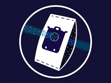 Ilustracja przedstawia worek do odkurzacza z centralnym otworem, umieszczony w białym okręgu na ciemnym tle. Wokół worka widoczne są niebieskie i białe kropki sugerujące przepływ powietrza.