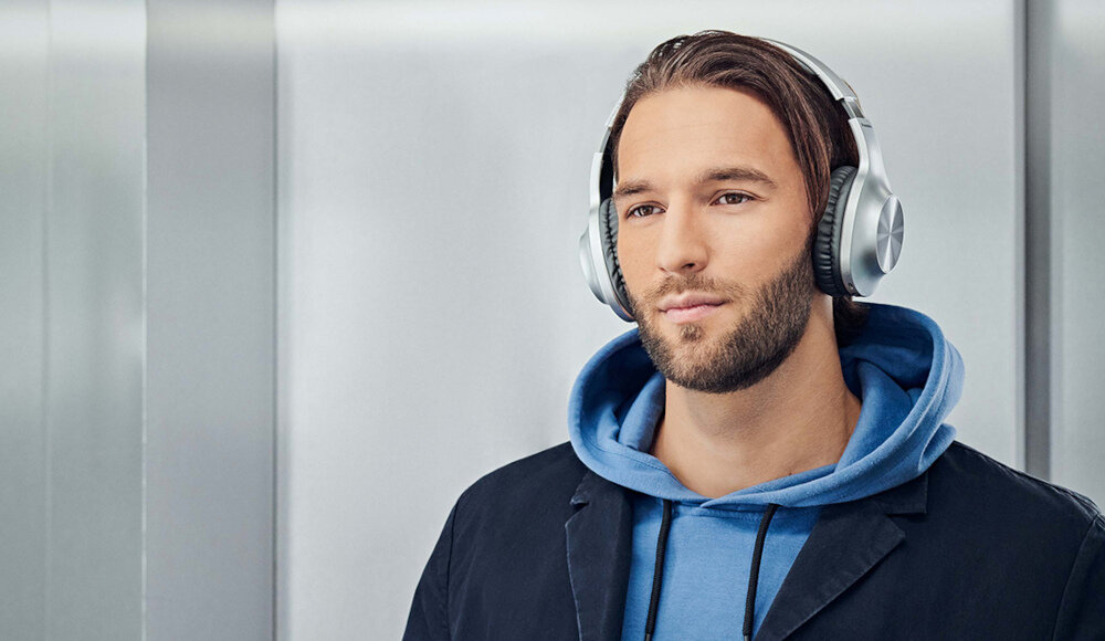 Słuchawki nauszne PANASONIC RB-HX220 wygoda bezprzewodowe uniwersalność zasięg dźwięk mocny bas brzmienie ergonomia konstrukcja akumulator