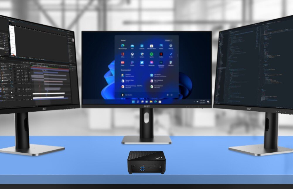 Komputer MSI Cubi 5 12M-479XEU Stanowisko pracy z trzema monitorami podłączonymi do jednego niewielkiego komputera na biurku