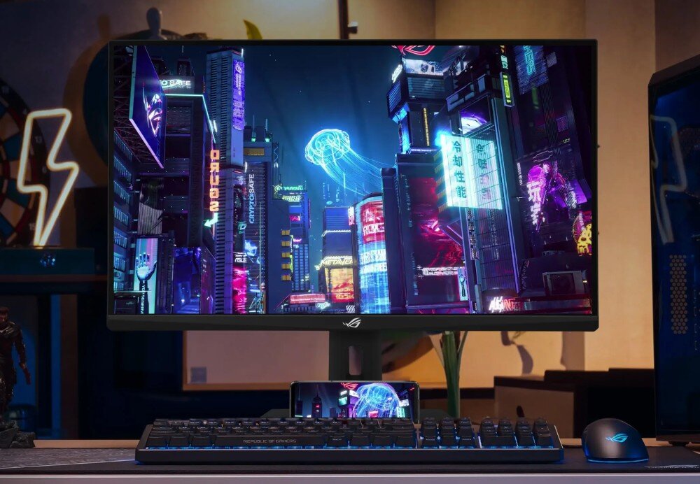 Monitor ASUS ROG Strix XG279CNS Monitor na biurku z klawiaturą myszką i telefonem na tle pokoju gracza, przekątna, rozdzielczość, odświeżanie, matryca