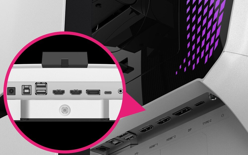 Monitor MSI MPG 274URDFW E16M Zbliżenie na dolny panel portów monitora w białej obudowie z różową grafiką lupy powiększającą złącza HDMI, DisplayPort i USB
, porty, złącza