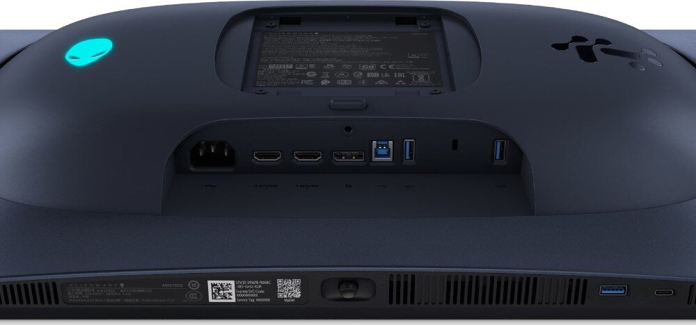 Monitor DELL Alienware AW2725Q Zbliżenie na dolny panel portów z tyłu monitora obejmujące gniazdo zasilania, złącza wideo i USB oraz joystick sterujący
