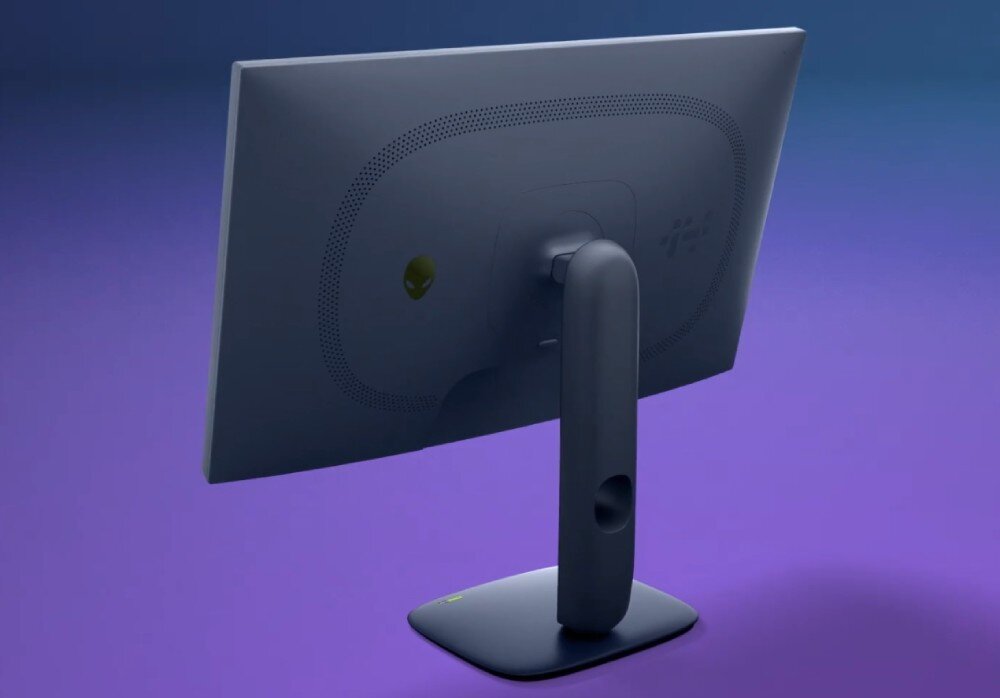 Monitor DELL Alienware AW2725DM Tył monitora komputerowego z widocznym logo marki, perforacją chłodzącą oraz szeroką nogą podstawy, zaprezentowany na fioletowym tle