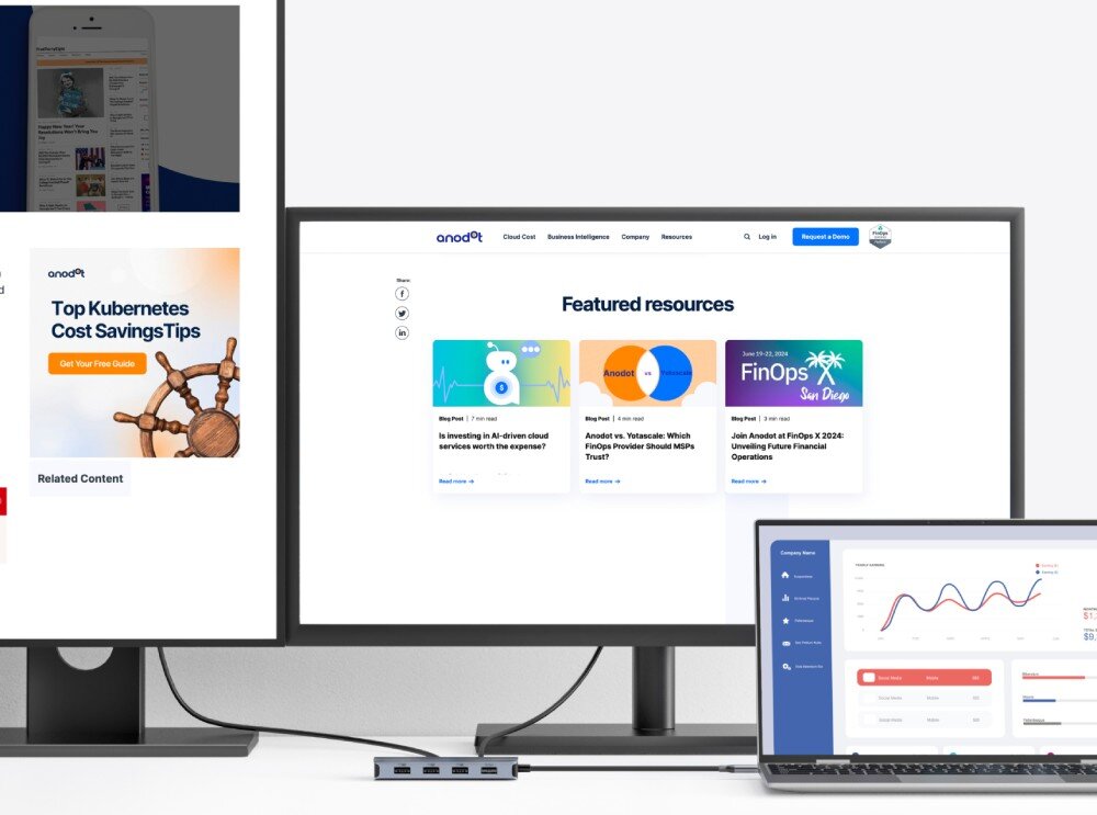 Hub ANKER A83740A1 7w1 Hub podłączony do laptopa, obsługujący dwa zewnętrzne monitory wyświetlające strony internetowe oraz wykresy w jasnym biurze