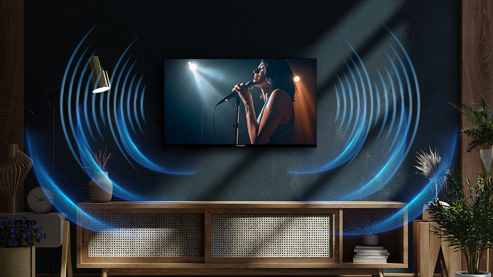 Telewizor TELEFUNKEN TFL-40BPF1000 - Dobrej jakości dźwięk, czyste dialogi, zbalansowane brzmienie, telewizor zawieszony na ścianie, z którego wydobywa się dźwięk