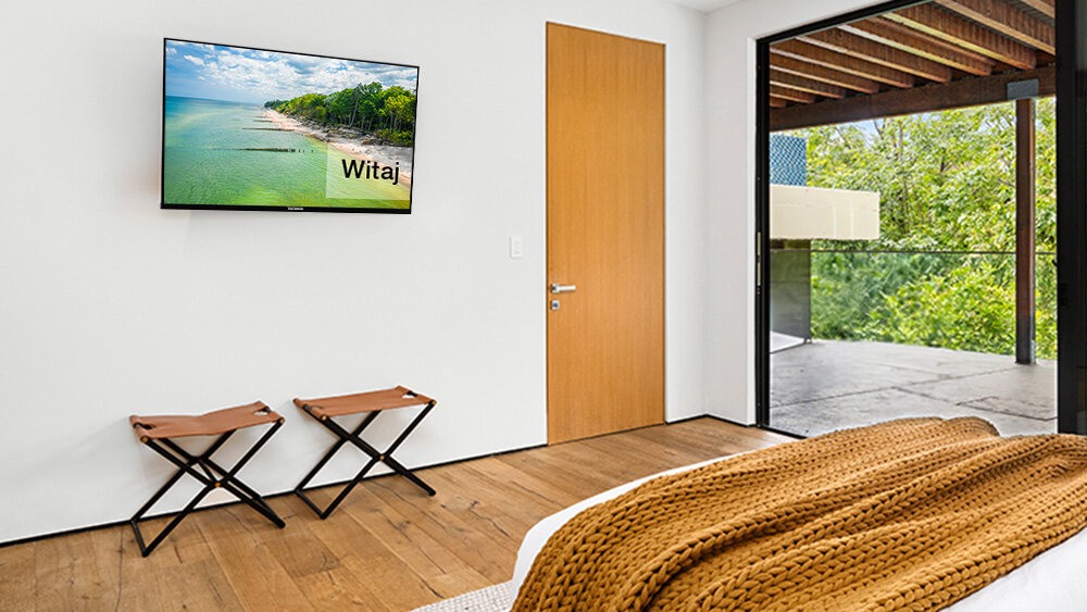 Telewizor TELEFUNKEN TFL-40BPF1000 - Tryb hotelowy, ustawienie ekranu powitalnego, telewizor zawieszony na ścianie w hotelu