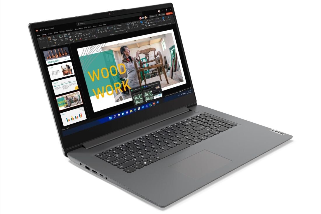 Laptop z otwartym ekranem, na którym wyświetlana jest prezentacja z napisem \\'WOOD WORK\\'. Klawiatura jest pełnowymiarowa, a obudowa ma ciemny kolor.