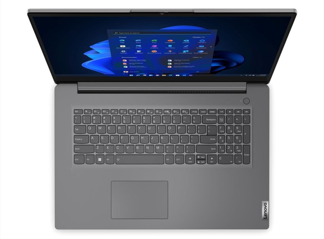 Laptop z otwartym ekranem, na którym widoczny jest pulpit systemu Windows 11. Na obudowie znajduje się logo \\'Lenovo\\'.