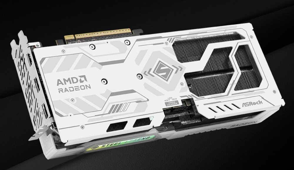 Karta graficzna ASROCK Radeon RX 9060 XT Steel Legend 16GB OC Widok tylnej części białej karty graficznej z metalowym backplate’em. Widać logo 'AMD RADEON' i elementy konstrukcyjne chłodzenia, metalowa osłona, wygląd, wytrzymałość