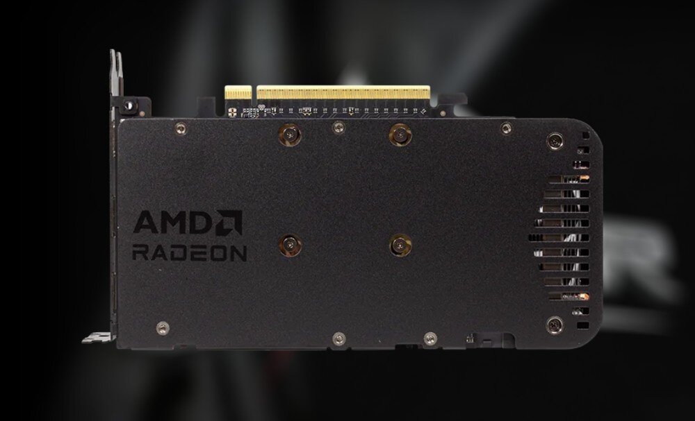 Karta graficzna POWERCOLOR Radeon RX 9060 XT Reaper 8GB Widok tylnej części karty graficznej z metalową płytką ochronną i logo 'AMD Radeon'. W tle rozmyte światło na czarnym tle, komponenty, konstrukcja