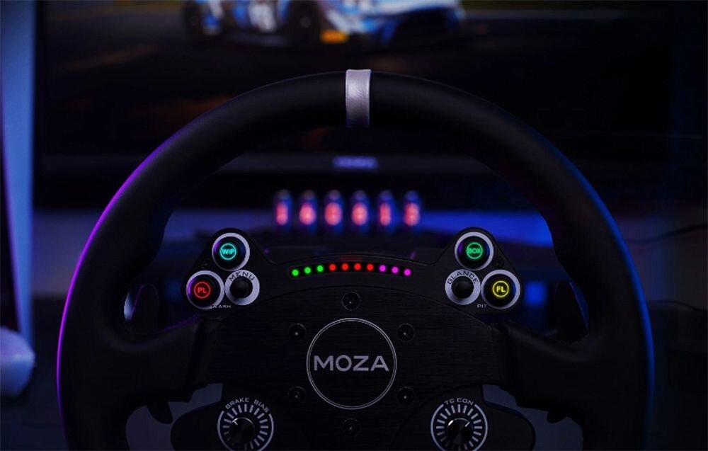 Kierownica MOZA Racing CS V2P (PC) Zbliżenie na górną część kierownicy gamingowej Moza Racing CS V2P 13-calowa obręcz aluminium klasy lotniczej magnetyczne łopatki z kutego włókna węglowego mechaniczne przyciski technologia bezprzewodowa MOZA Invisible Connect szybkozłączka Quick Release komfort