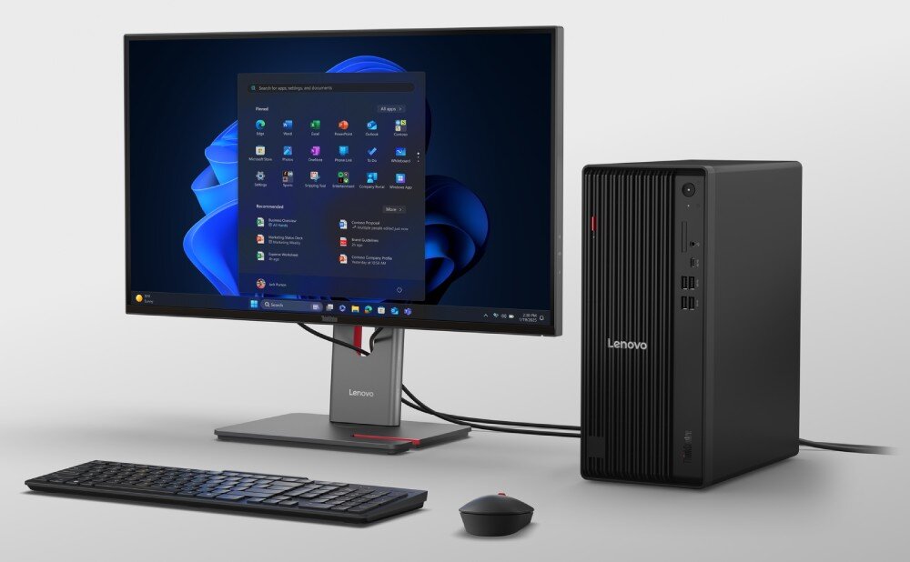 Komputer LENOVO ThinkCentre M70t Gen 6 Pełny zestaw komputerowy na szarym tle, składający się z czarnej obudowy tower, czarnej klawiatury, czarnej myszy i monitora z wyświetlanym interfejsem Windows 11, procesor, rdzenie, technologie, wydajność