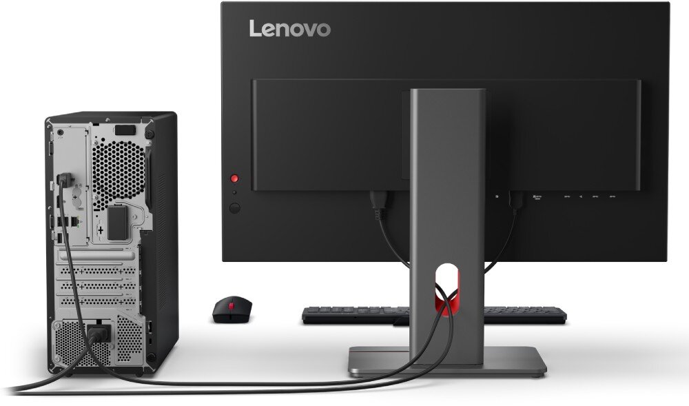 Komputer LENOVO ThinkCentre M70t Gen 6 Widok od tyłu zestawu komputerowego, pokazujący tylne panele monitora i czarnej obudowy tower, z widocznym okablowaniem, oraz klawiaturę i mysz z przodu, obudowa, wentylacja