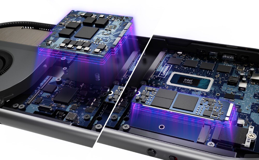 Komputer LENOVO Yoga F0J2001FPB Zbliżenie na wnętrze komputera, pokazujące płytę główną z oznaczeniem 'Intel Core' oraz nałożone warstwy układów scalonych w niebieskim i fioletowym świetle, podzespoły, procesor, pamięć, dysk, karta graficzna