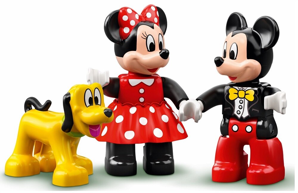 Na obrazku znajdują się trzy figurki LEGO przedstawiające postacie z kreskówek: żółty pies, myszka w czerwonej sukience w białe kropki oraz myszka w czerwonych spodniach i czarnym fraku z żółtą muszką.