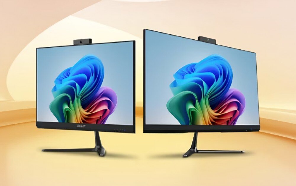 Komputer ACER Aspire C24-2YE13U3UNL Dwa monitory typu all-in-one ustawione obok siebie na jasnym tle, wyświetlające kolorową grafikę systemu operacyjnego, opis