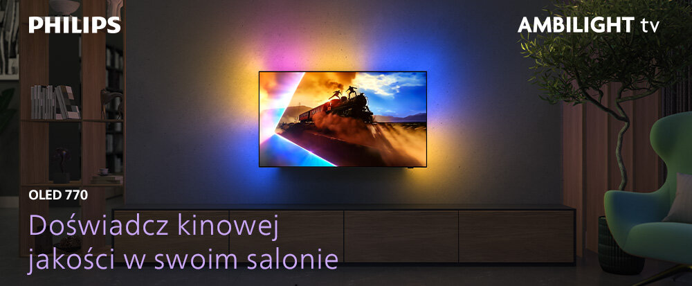 Na obrazie widoczny jest telewizor na ścianie z włączonym ekranem, emitujący kolorowe światło na ścianę. Tekst na obrazie: \'PHILIPS OLED 770 Doświadcz kinowej jakości w swoim salonie AMBILIGHT tv\'.