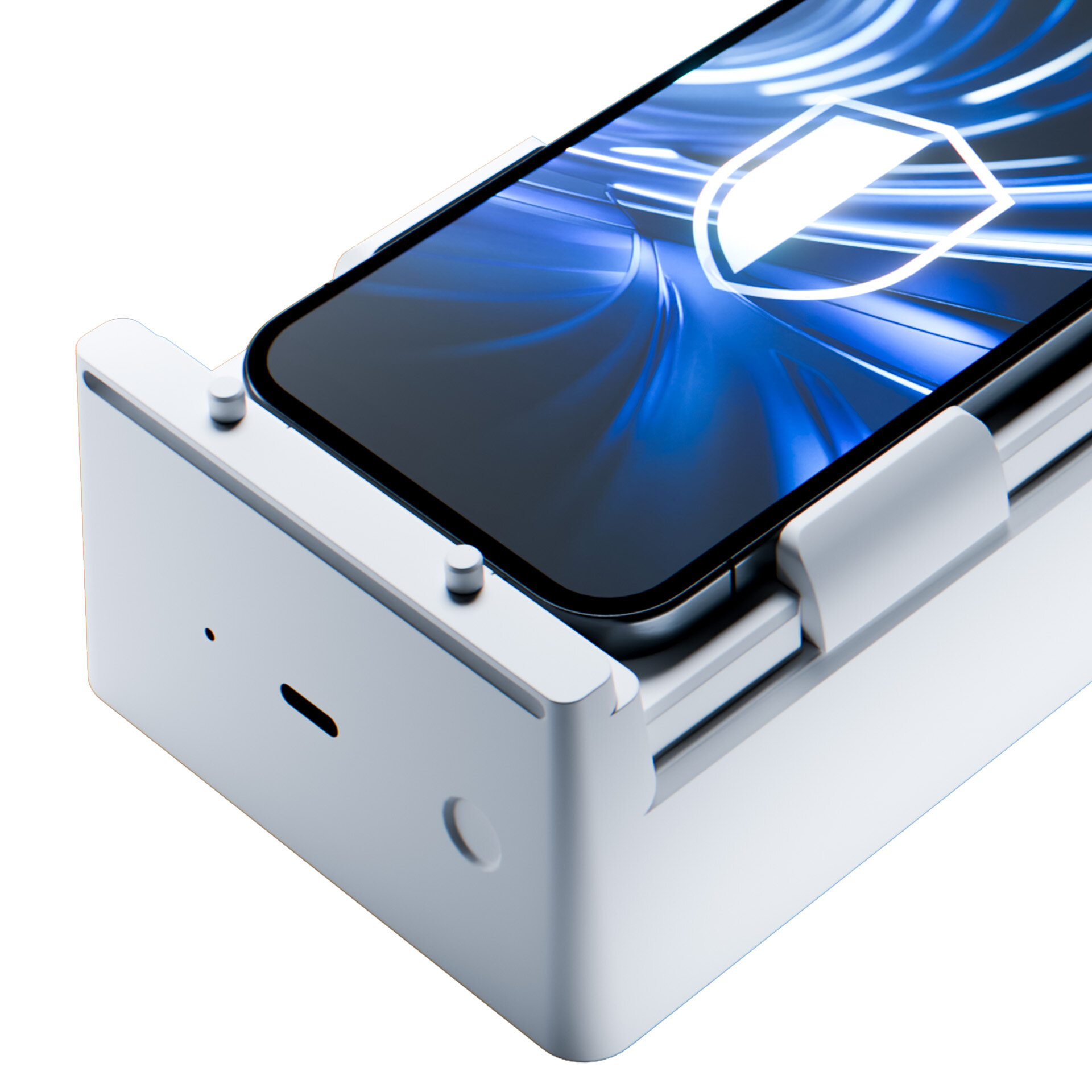 Na obrazie widoczny jest telefon z wyświetlaczem, na którym znajduje się symbol tarczy. Telefon umieszczony jest w białym uchwycie.