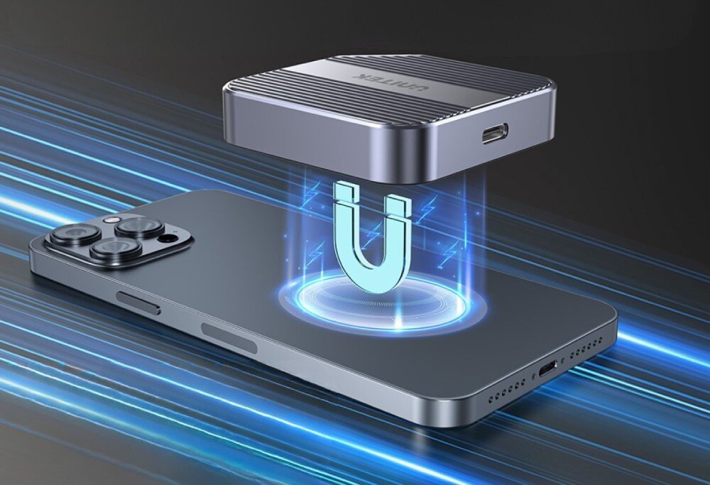 Obudowa dysku UNITEK S1244AGY01 Grafika prezentująca szary dysk Unitek unoszący się nad tyłem smartfona. Pomiędzy nimi znajduje się świetlista ikona magnesu, która ilustruje sposób mocowania akcesorium do telefonu