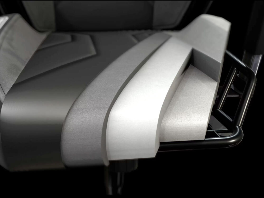 Fotel QUERSUS Vaos.2.3 Red Accent Czarny (czerwone elementy) prezentacja pianki w środku fotela na czarnym tle pianka QRS COLD-CURE™ nie odkształca się wygoda estetyka na lata