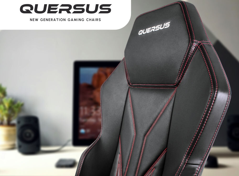 Fotel QUERSUS Vaos.2.3 Red Accent Czarny (czerwone elementy) prezentacja fotela od przodu pod kątem w tle pokój napis z marką na białym tle w górnym rogu