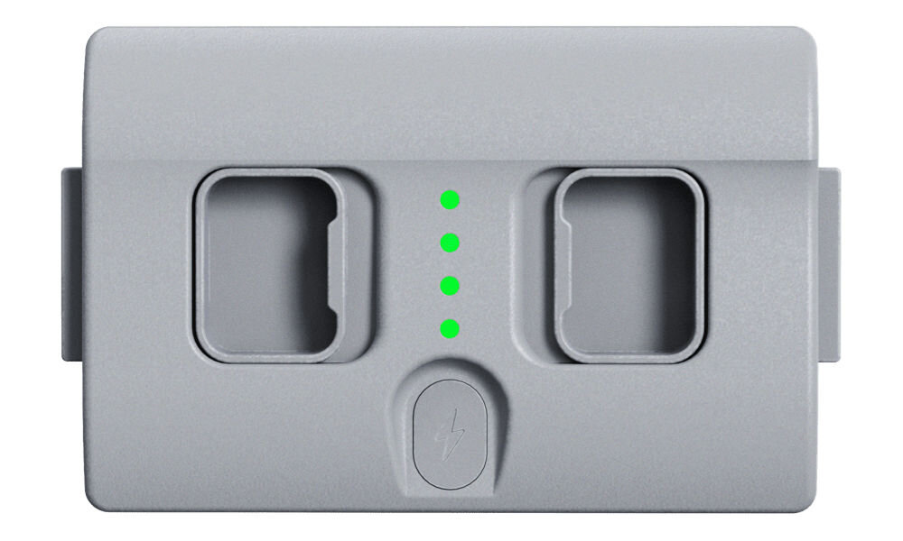 Bateria UNITREE Go2 Standard Zdjęcie studyjne, przedstawiające szary akumulator do robota Unitree z przodu. Wyraźnie widoczne są dwa gniazda do podłączenia do robota, wskaźnik naładowania z czterema zielonymi diodami LED i okrągły przycisk z ikoną błyskawicy.