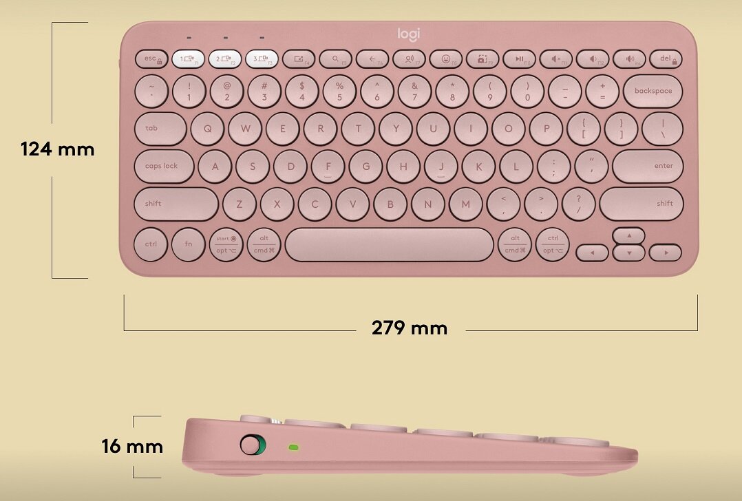 Na obrazie widoczna jest różowa klawiatura z okrągłymi klawiszami, oznaczona logo \'logi\'. Wymiary klawiatury to 124 mm wysokości, 279 mm szerokości i 16 mm grubości.